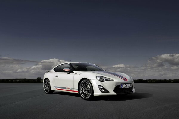 White toyota gt86 between the sky and asphalt