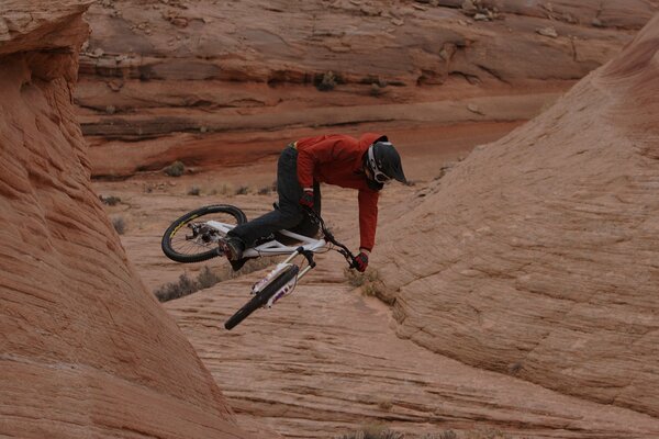 Cyclist in extreme mountains