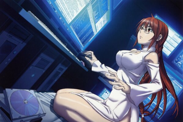 Red-haired anime girl at the computer