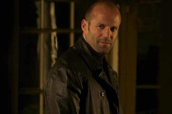 Portrait of Jason Statham looking into the camera