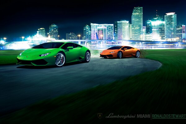 Green and orange cars on the bridge