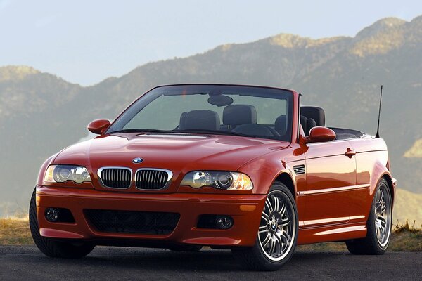 BMW E46 convertibile rossa in montagna