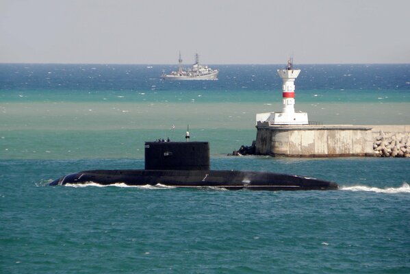 A submarine is on the horizon. sea and horizon