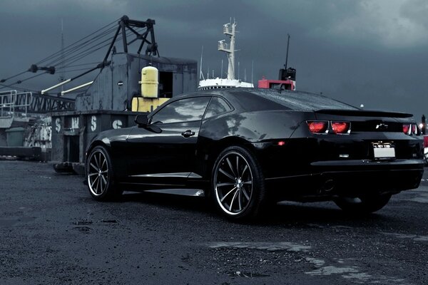 Black car corvette on the dock