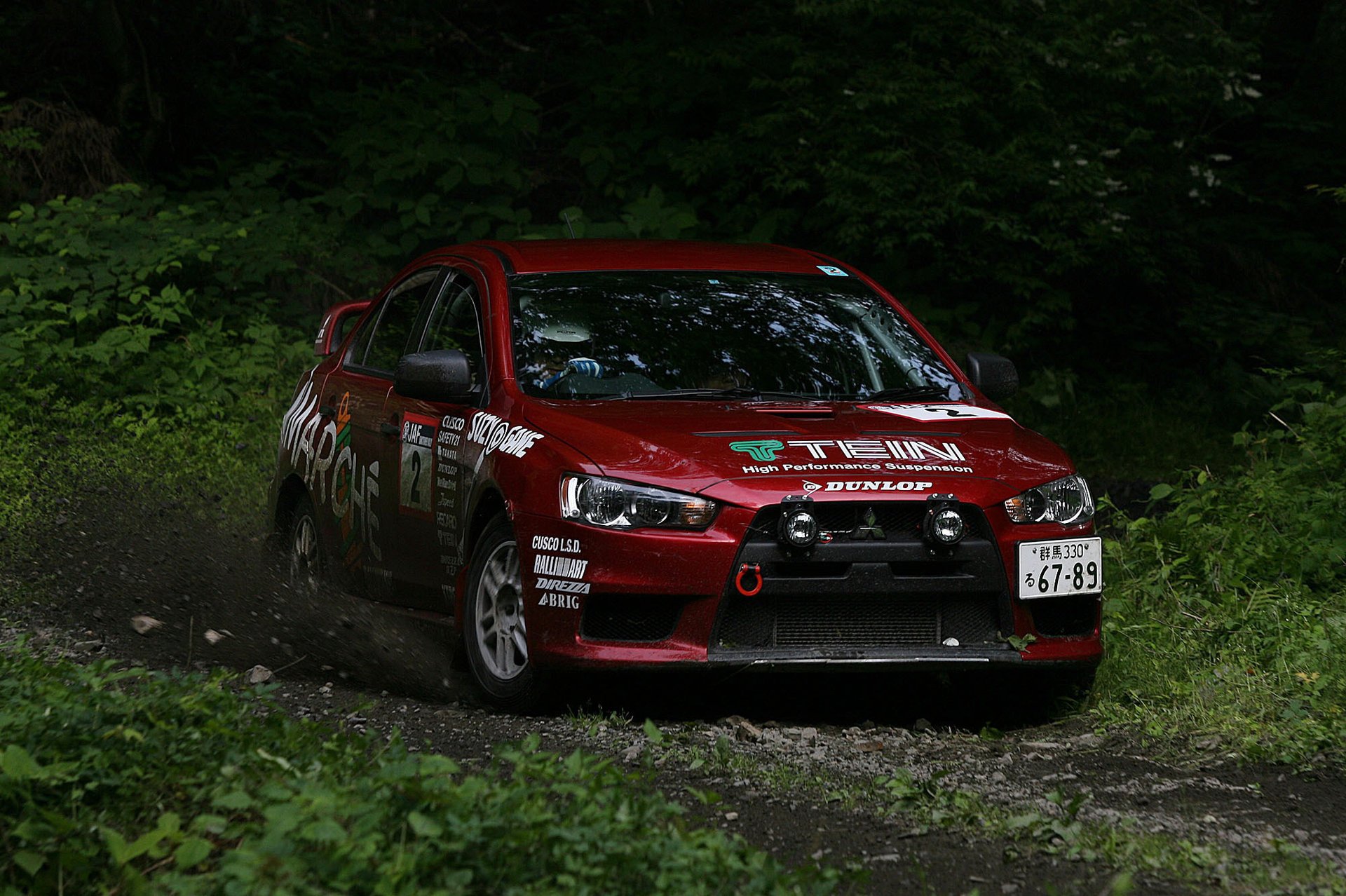 lancer x voiture rallye mitsubishi auto voiture rouge lettrage mitsubishi forêt broussailles verdure voitures de tourisme voitures transport véhicules