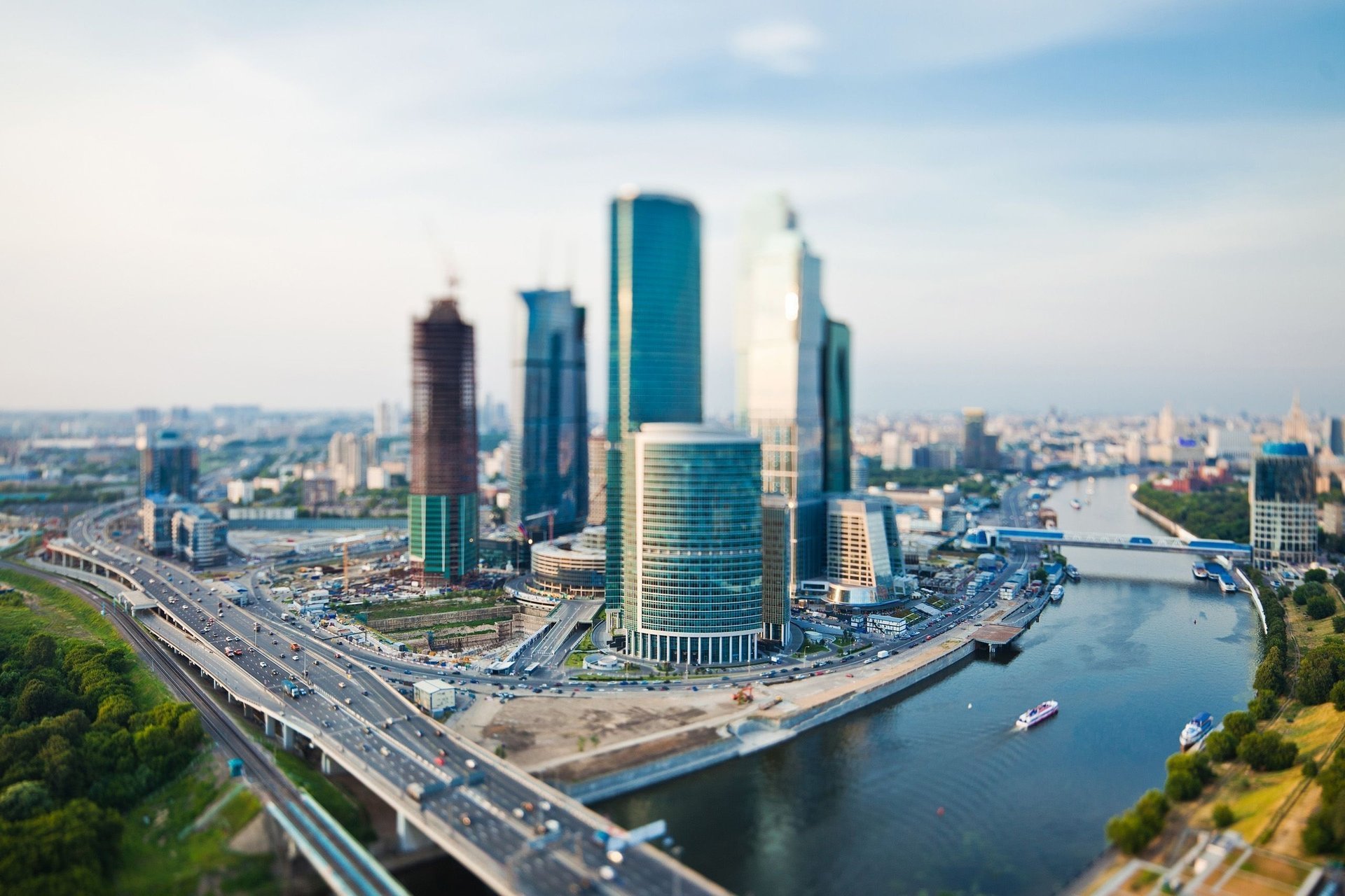 moscow panorama road moscow-city river the city megapolis capital russia bridge boat auto movement view building skyscrapers home trees promenade