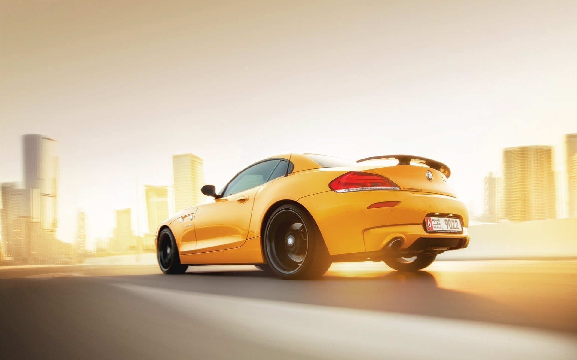 bmw z4 yellow car sunset speed rear