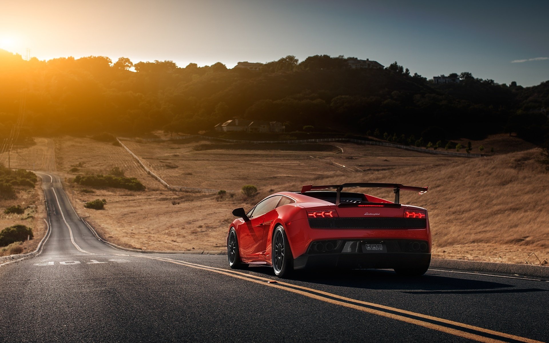 lamborghini gallardo lp570-4 super trofeo supersportwagen hinten straße sonne spoiler rot