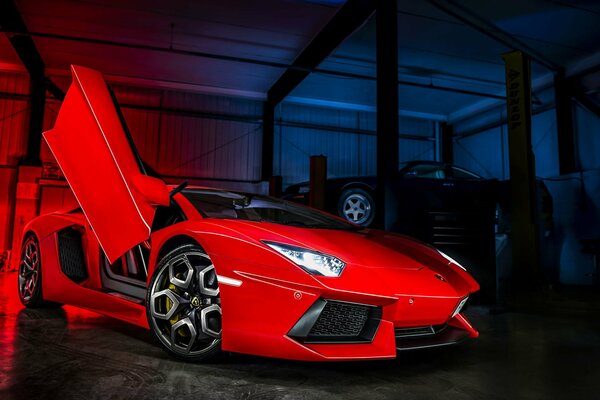 Lamborghini avendator rouge dans le garage, lueur au néon