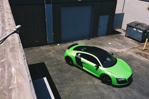 Green Audi sports car in the garage