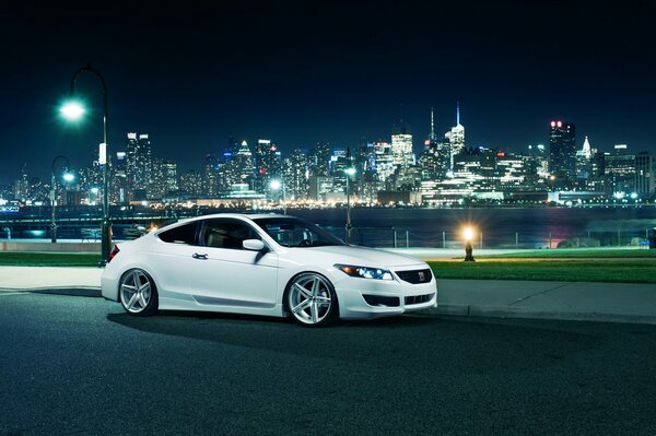 The new Honda Accord rides around the city at night