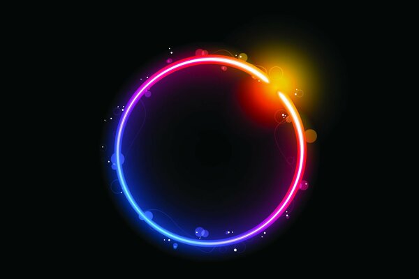 Círculo compuesto de colores del arco iris sobre fondo negro