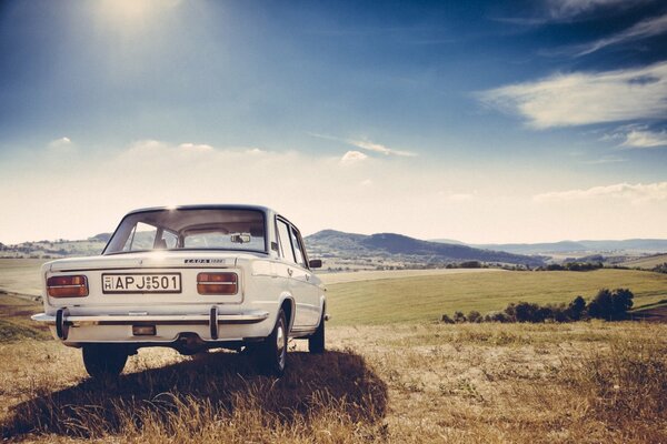 White Zhiguli in the steppe on a summer day