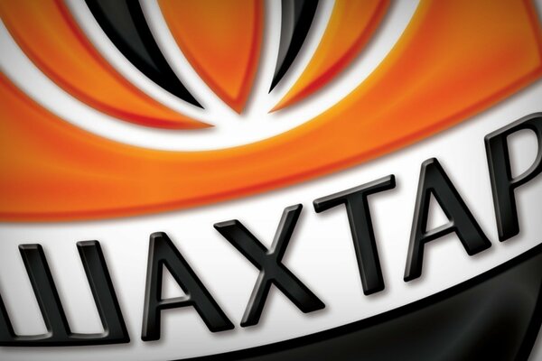 Photo du logo avec l inscription Shakhtar 