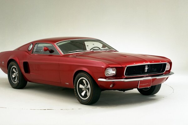 Cherry Ford Mustang on a white background