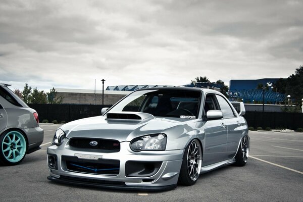 Subaru tuned, subaru tuned in an industrial area, silver subaru, subaru black and white image