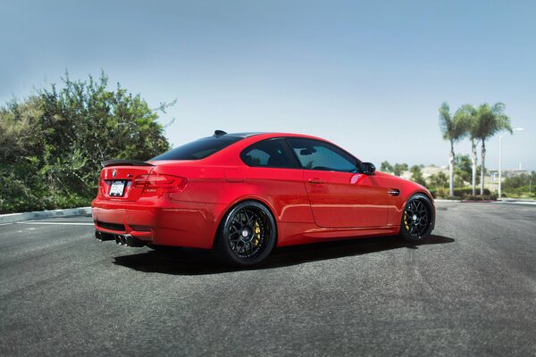 The red BMW is beautiful on all roads