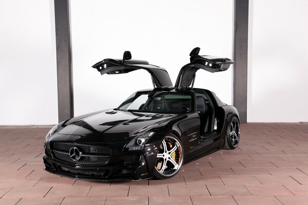 Black Mercedes Coupe doors open up