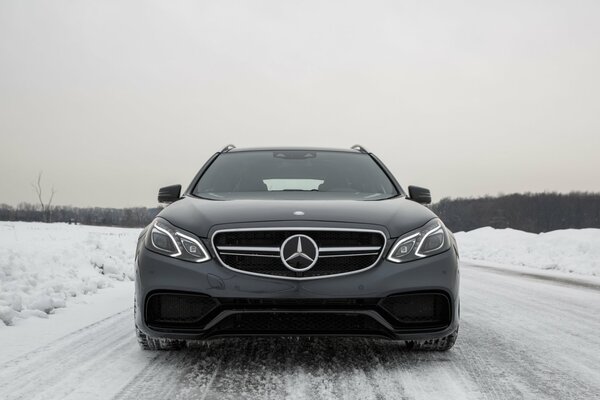 Mercedes on a deserted winter road