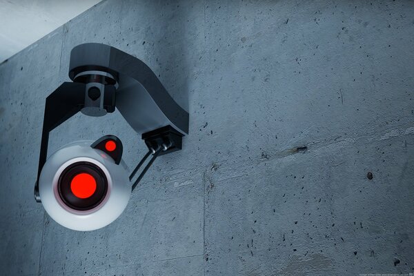 Kamera Monitorująca na szarej ścianie