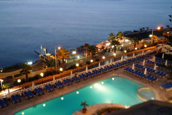 Sea. Lights. Swimming pool. Night