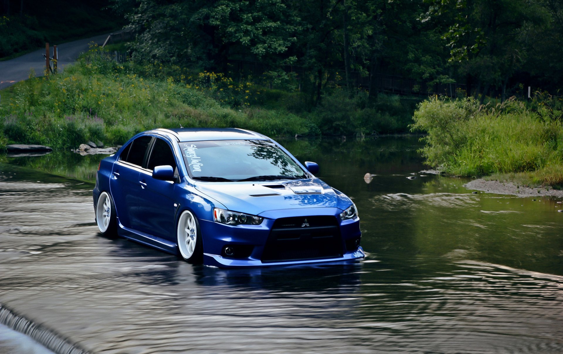 mitsubishi profession evo bleu eau