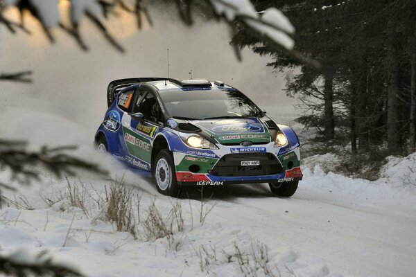 Ford fiesta rides on a snowy road