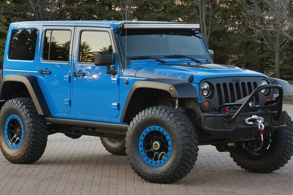 Blue jeep with tinted windows