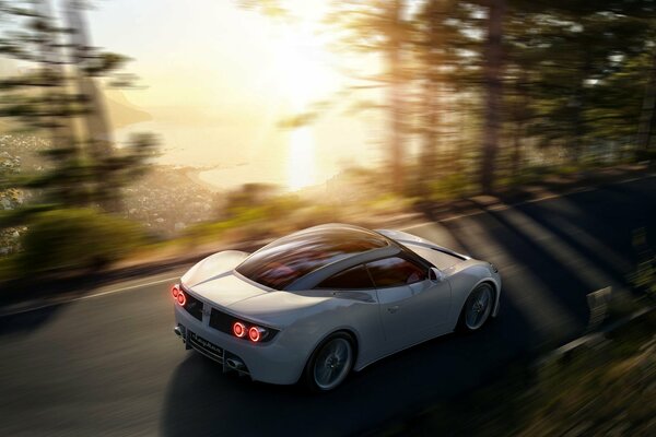 Fast driving of a beautiful white sports car