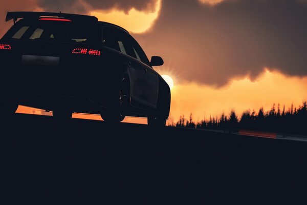 Schöne und stilvolle Autos audi rs-6 vor dem Hintergrund eines unglaublichen Sonnenuntergangs