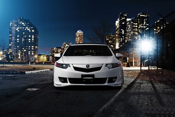 Car Honda accord and a view of the night city