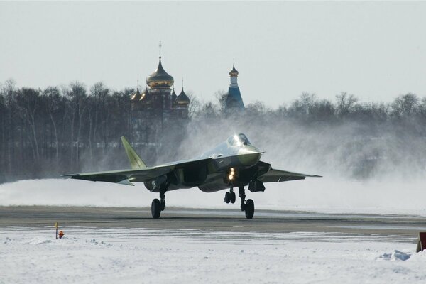 Истребитель т-50 на фоне церкви