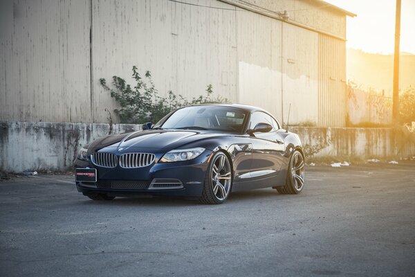 Dark car on garage background