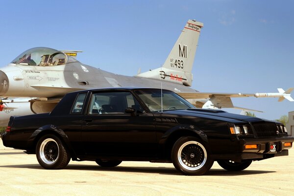 Car and plane on the sky background