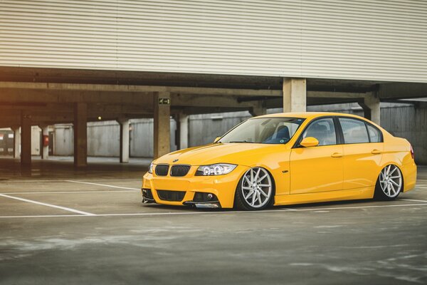 Parked bmw 3 series in yellow