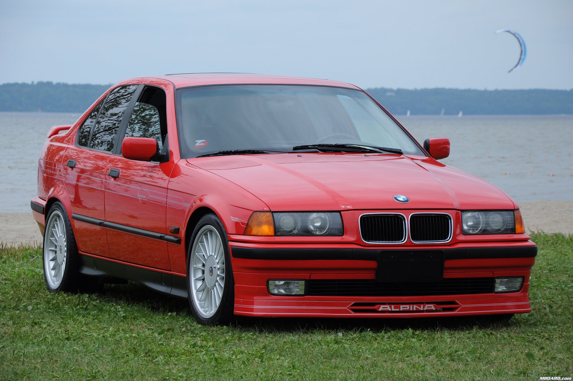 alpina b3 alpina e36 red germany bavaria bmw bmw techno design auto red car car sky car transport grass greenery lawn passenger cars motor transport