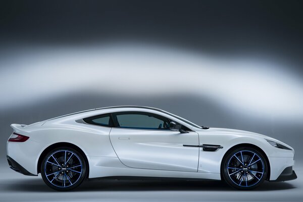 Side view of a white aston martin