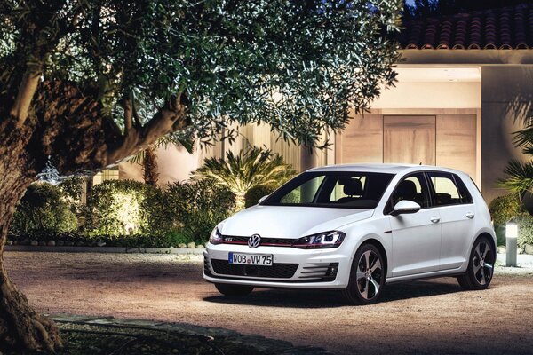 White volkswagen at home in the evening light