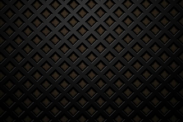 Black grille on a brown wall background