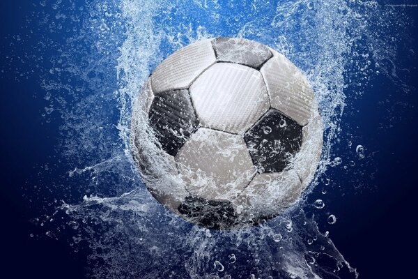 A soccer ball in a splash of water