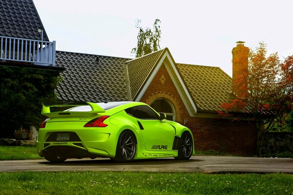 A flashy sports Nissan with a rear view