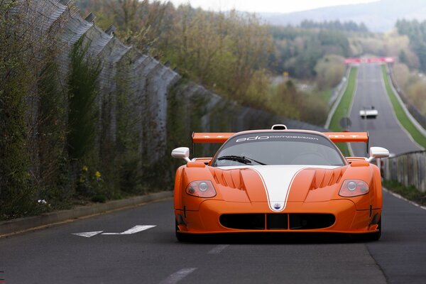 Maserati gran turismo supercar on the track