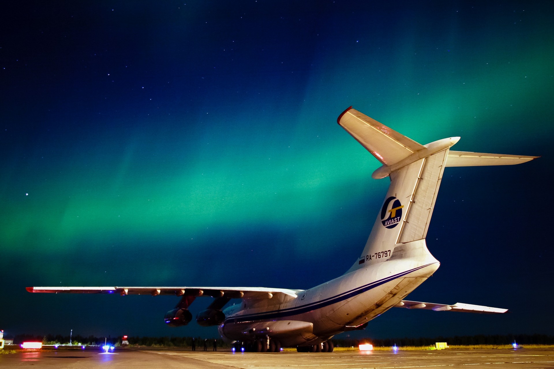 plane northern lights night il-76