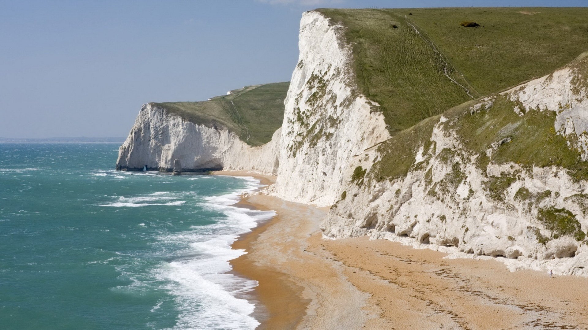 white soils mounds water mountains shore rocks greens surf landscape nature wave coast