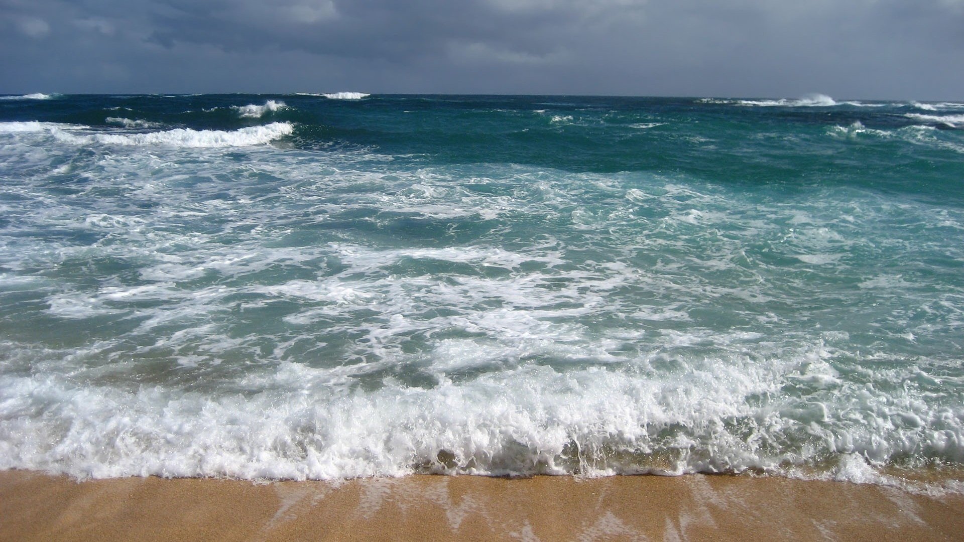 the coastal area surf foam water sea clouds horizon wave shore beach sand