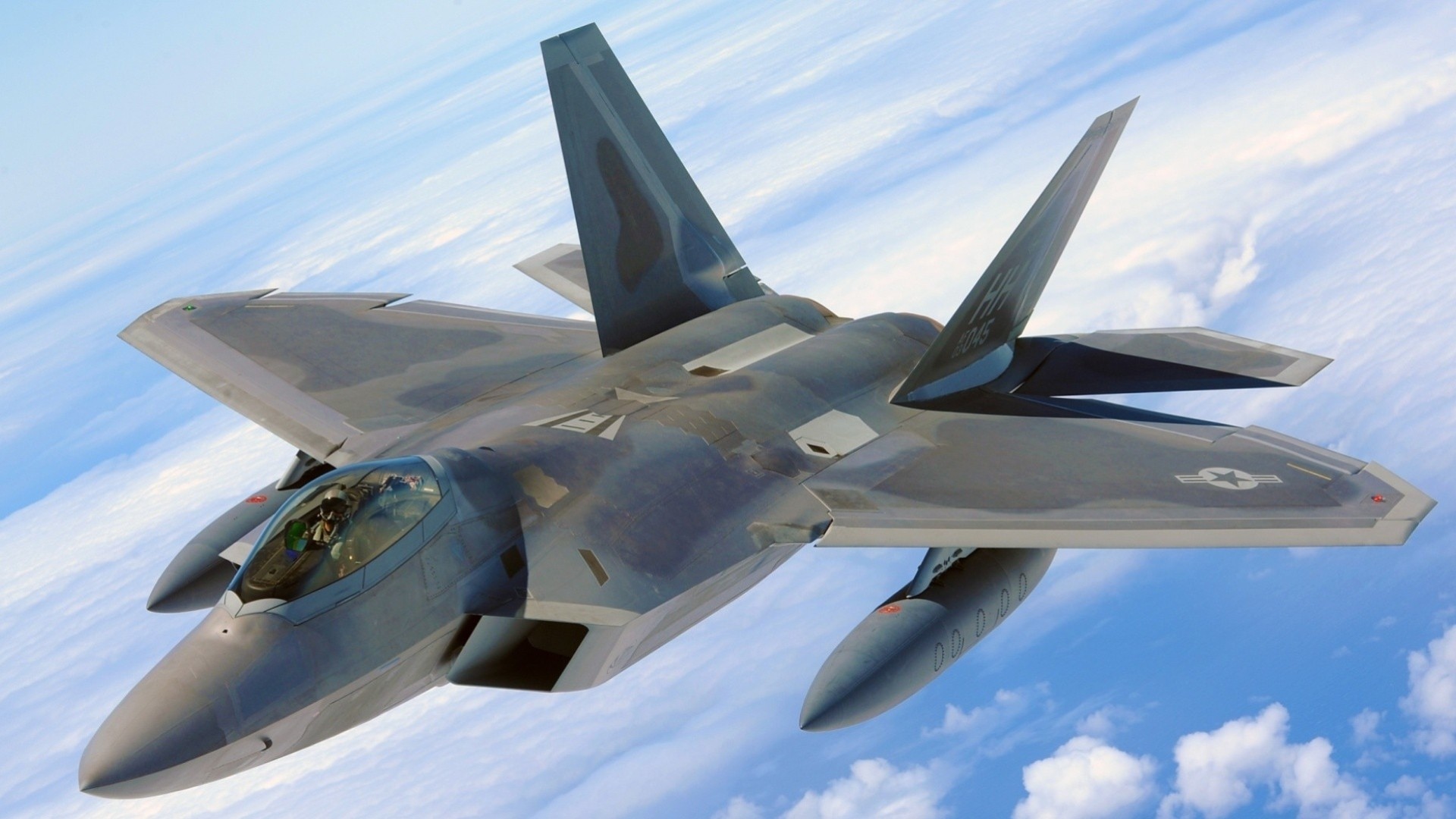 ciel raptor avion f-22 bleu gros plan