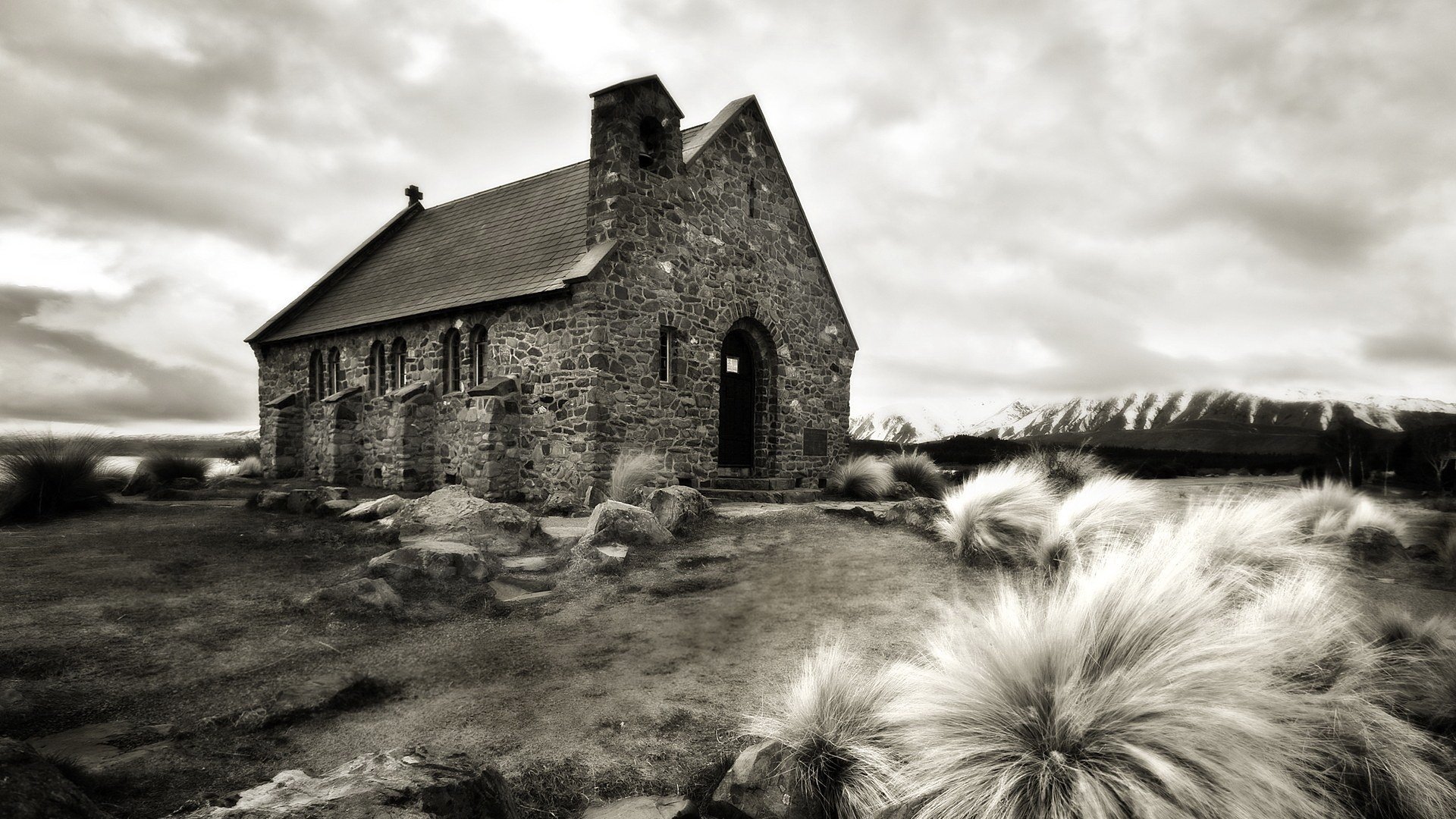 tone house dry bushes mediocrity religion home the wind clouds structure overcast stones house