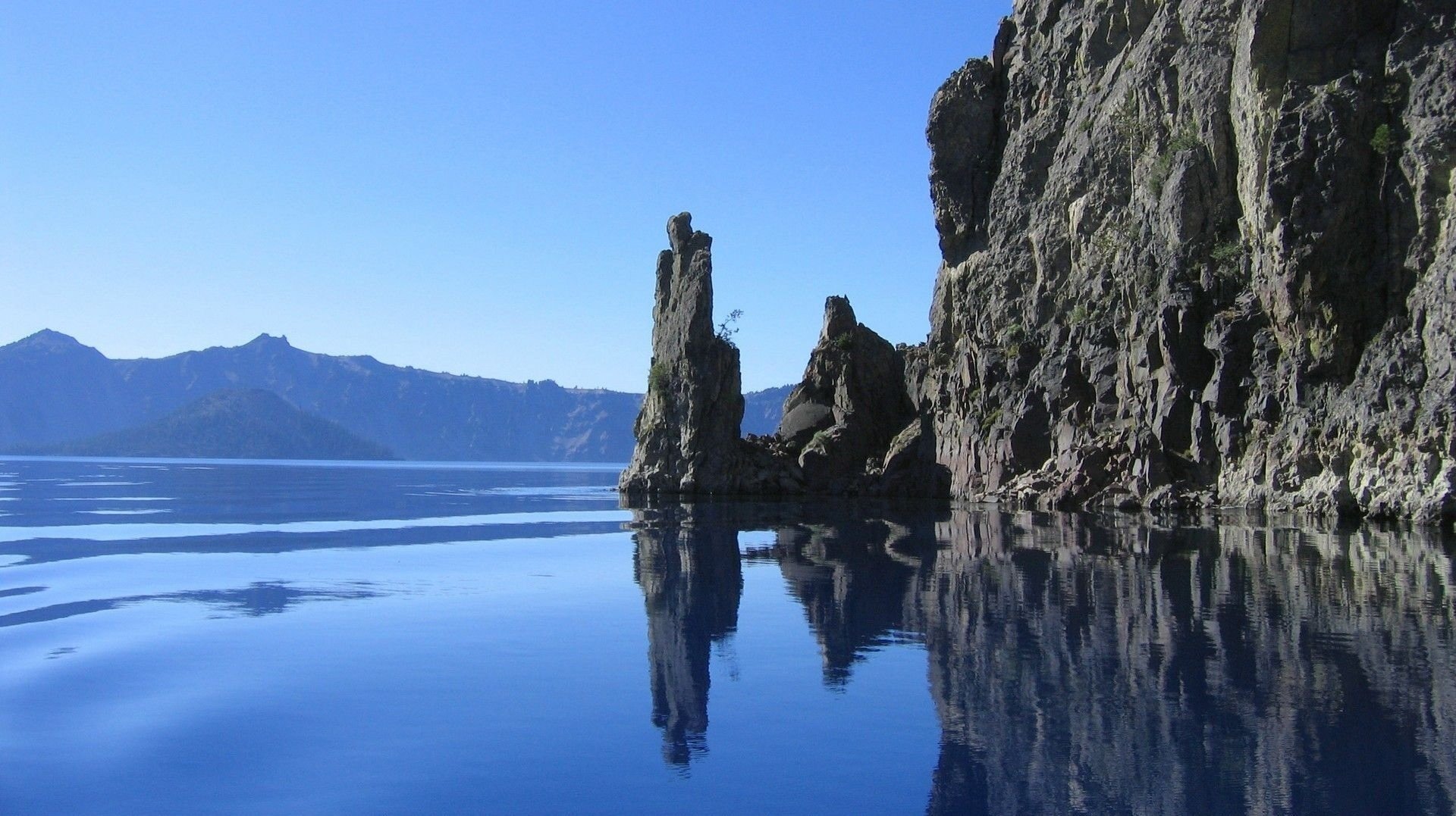 felsen klippe meerwasser wasser oberfläche berge felsen ansicht landschaft natur himmel