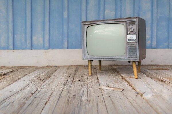 An old tube TV with buttons