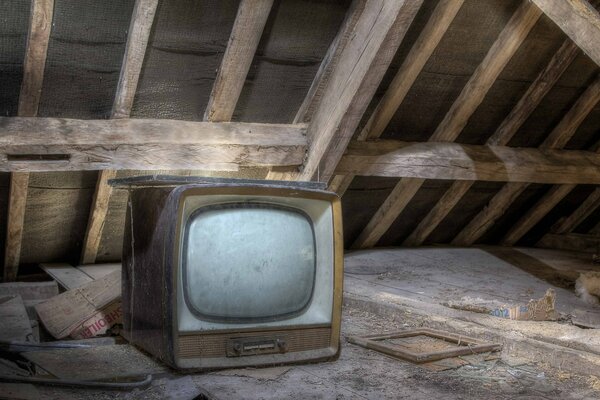 An old TV in a dusty attic